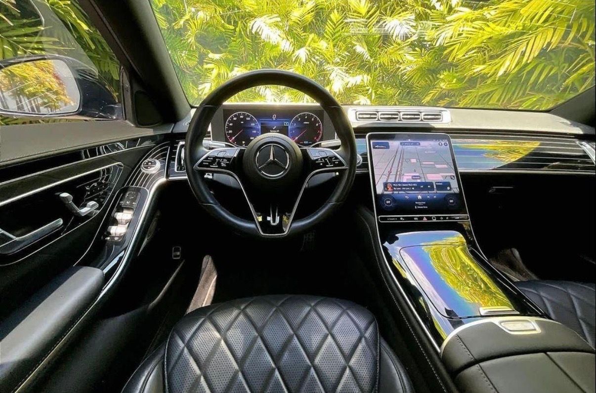 Actual S580 driver cockpit with digital cluster, MBUX touchscreen and diamond-quilted leather