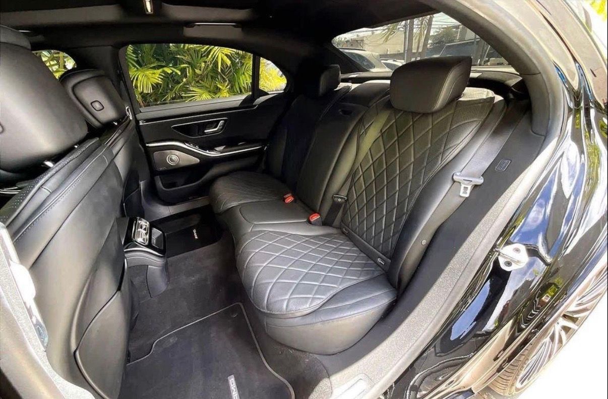 Actual S580 rear cabin with diamond-quilted black leather seats and panoramic roof